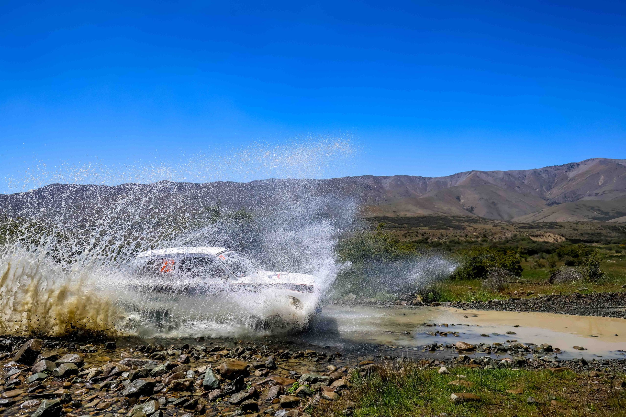 Time-Trial car driving to a precise average speed on NZ gravel